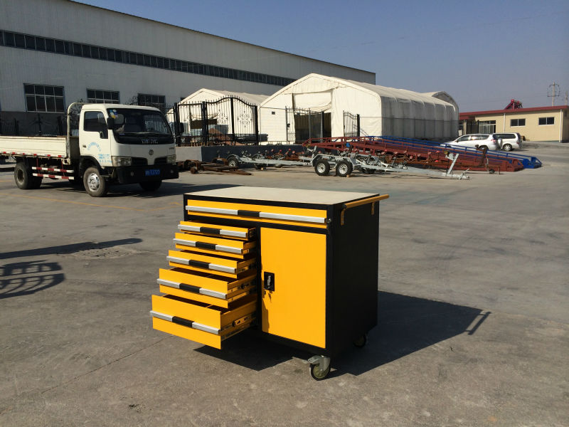 yellow metal tool trolley